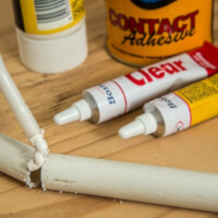 Glue, adhesives, and other expoxies fixing a PVC pipe