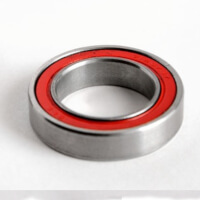 A plain bearing with a red ring