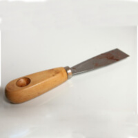 A putty knife with a wooden handle